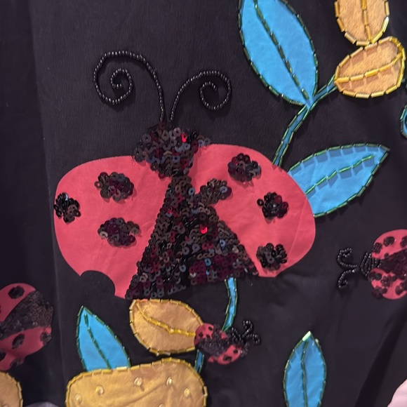 Fold over neckline with butterfly designs with sequins - Picture 6 of 8